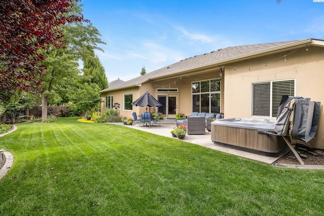 439 Cherry Blossom Loop, Richland, WA 99352 - back of house with a hot tub, stucco siding, a patio area, and outdoor lounge area
