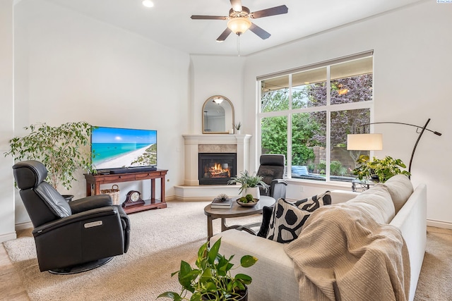 439 Cherry Blossom Loop, Richland, WA 99352 - carpeted living area with ceiling fan and a glass covered fireplace