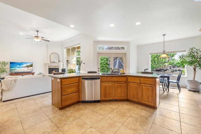 439 Cherry Blossom Loop, Richland, WA 99352 - kitchen featuring dishwasher, a lit fireplace, recessed lighting, a ceiling fan, and open floor plan