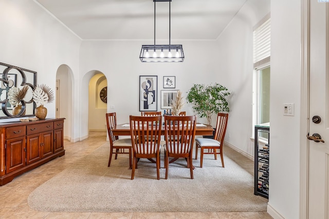 439 Cherry Blossom Loop, Richland, WA 99352 - dining space featuring arched walkways, crown molding, and a towering ceiling