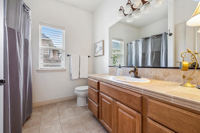 439 Cherry Blossom Loop, Richland, WA 99352 - bathroom featuring vanity, tile patterned floors, and a shower with curtain