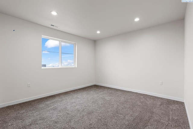 spare room with carpet flooring