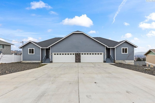 single story home with a garage