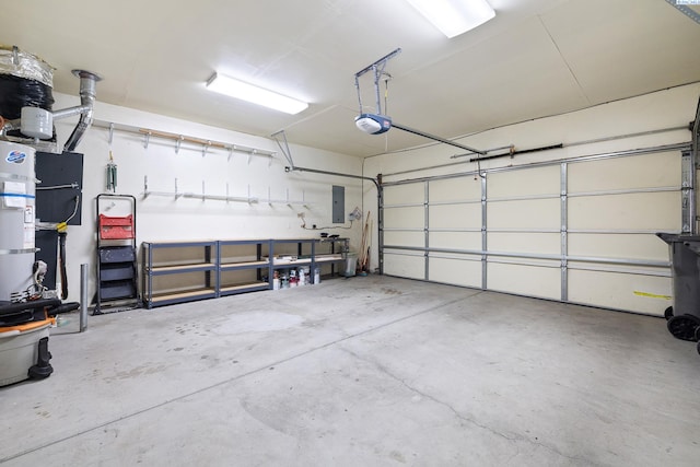 garage with electric panel and a garage door opener