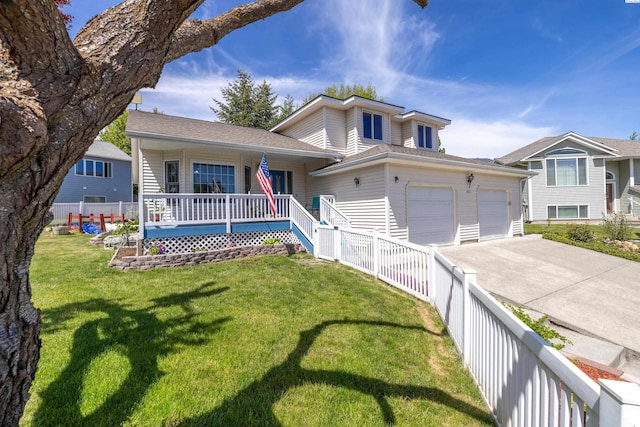 485 NW Thomas St, Pullman, WA 99163 - split level home with concrete driveway, covered porch, and an attached garage