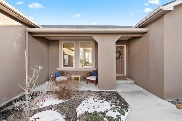 property entrance with a patio area