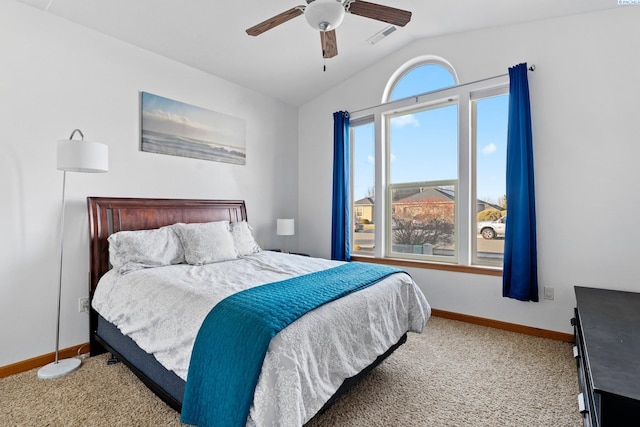 bedroom with carpet floors, ceiling fan, and vaulted ceiling