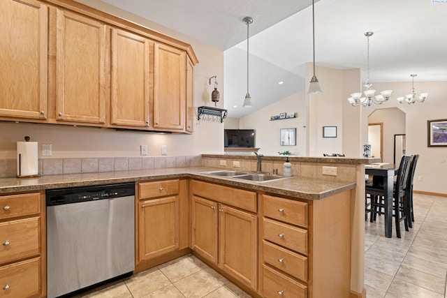 kitchen featuring sink, hanging light fixtures, stainless steel dishwasher, light tile patterned floors, and kitchen peninsula