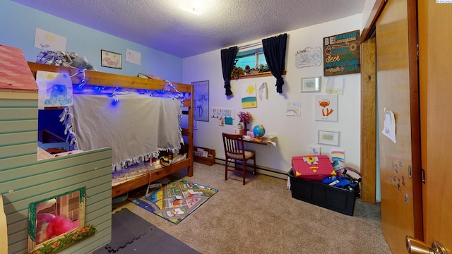 938-940 SW Cityview, Pullman, WA 99163 - carpeted bedroom featuring a textured ceiling and a baseboard heating unit