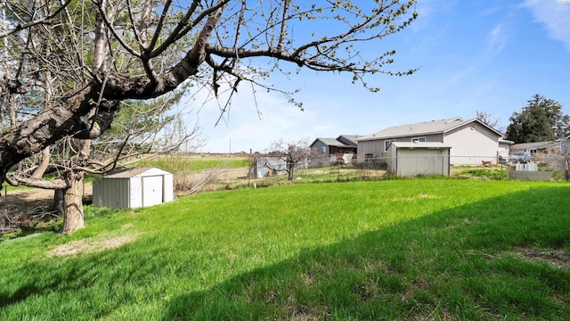 505 Armas Ct, Grandview, WA 98930 - view of yard with fence, an outbuilding, and a storage unit