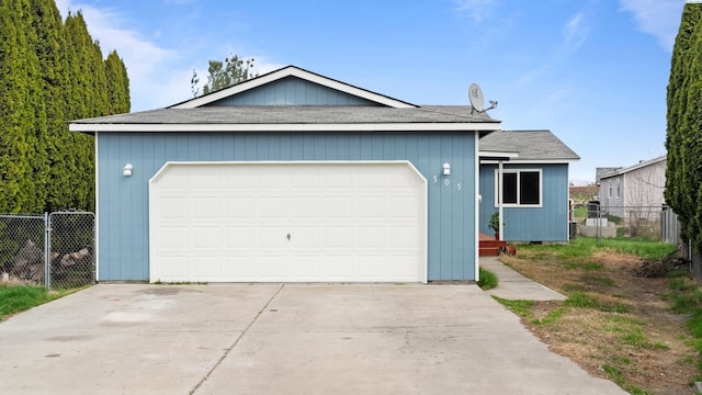505 Armas Ct, Grandview, WA 98930 - view of front of property featuring roof with shingles, concrete driveway, a garage, and fence