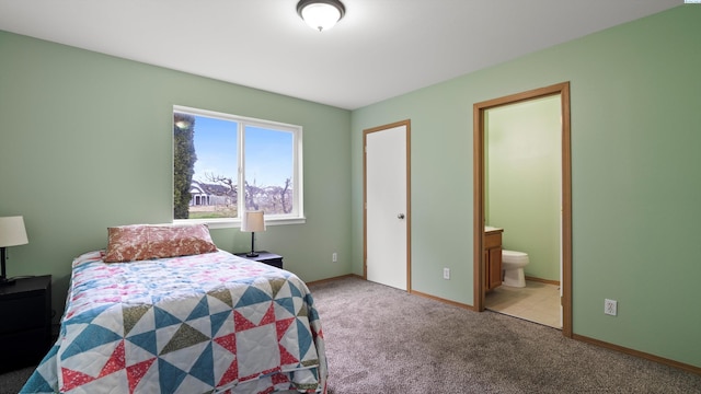 505 Armas Ct, Grandview, WA 98930 - bedroom featuring light carpet, ensuite bathroom, and baseboards