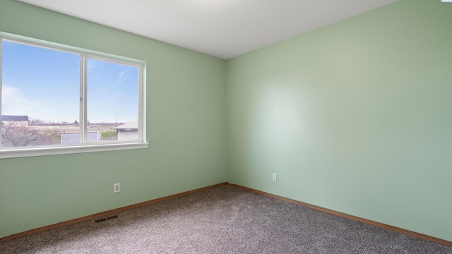 505 Armas Ct, Grandview, WA 98930 - carpeted empty room with visible vents and baseboards