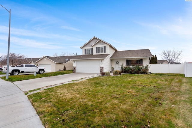 view of front of house featuring a garage and a front lawn