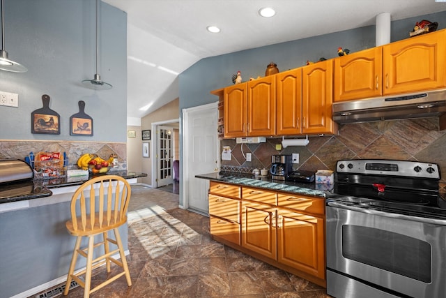 kitchen with decorative backsplash, vaulted ceiling, stainless steel electric range, and dark stone countertops