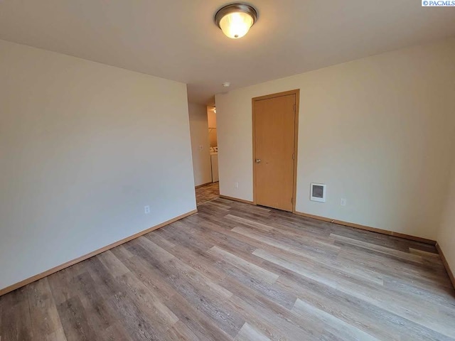 empty room featuring light hardwood / wood-style flooring