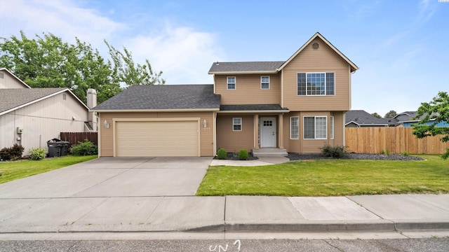 traditional home featuring a garage and concrete driveway