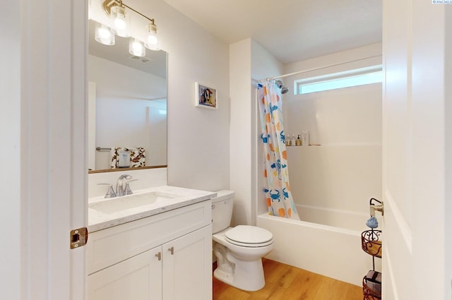 1609 Diamond Ave, Grandview, WA 98930 - full bathroom featuring vanity, shower / bathtub combination with curtain, and wood finished floors