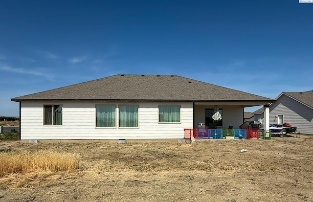 1609 Diamond Ave, Grandview, WA 98930 - rear view of property with crawl space and roof with shingles