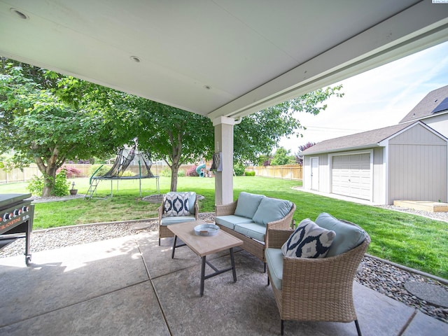 612 S Young St, Kennewick, WA 99336 - view of patio featuring a trampoline, a playground, an outdoor structure, and outdoor lounge area