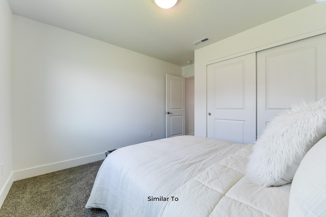 6665 W 29th Ct, Kennewick, WA 99338 - carpeted bedroom featuring baseboards and a closet