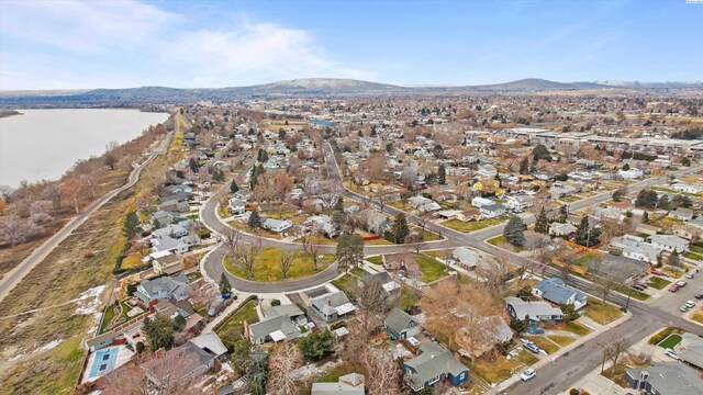 1830 Hunt Pt, Richland, WA 99354 - aerial view of property and surrounding area with nearby suburban area and a water and mountain view