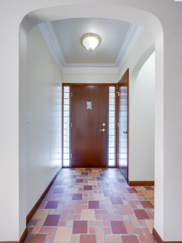 912 S Lake St, Colfax, WA 99111 - foyer featuring plenty of natural light, crown molding, and arched walkways
