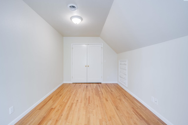 912 S Lake St, Colfax, WA 99111 - additional living space with light wood-type flooring and lofted ceiling