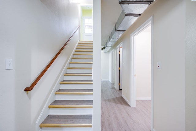 912 S Lake St, Colfax, WA 99111 - stairway featuring wood finished floors and baseboards
