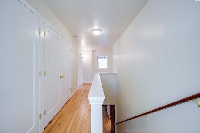 912 S Lake St, Colfax, WA 99111 - corridor with an upstairs landing and light wood finished floors