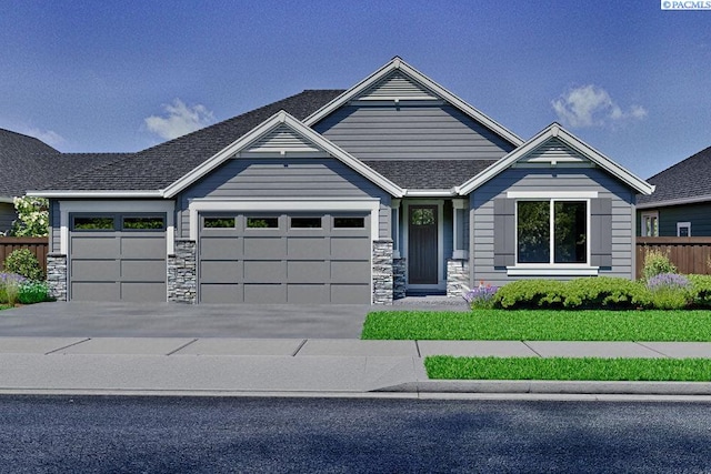 craftsman inspired home with a garage