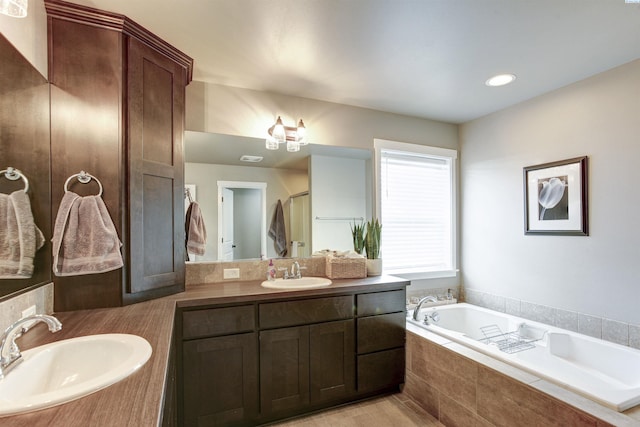 1390 Jade Ave, West Richland, WA 99353 - full bathroom featuring double vanity, a bath, and a shower