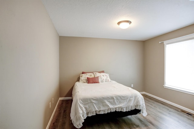 1390 Jade Ave, West Richland, WA 99353 - bedroom with wood finished floors and baseboards