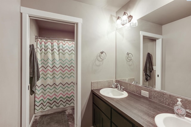 1390 Jade Ave, West Richland, WA 99353 - bathroom featuring double vanity and curtained shower
