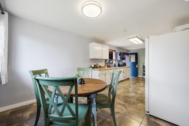 view of tiled dining space