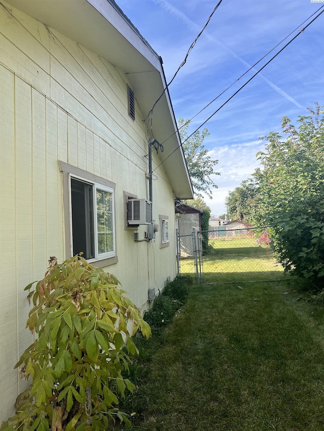 view of home's exterior featuring a yard