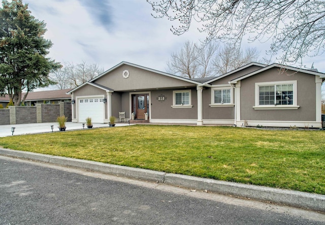 ranch-style home featuring stucco siding, driveway, fence, a front yard, and an attached garage