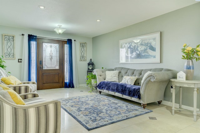 entrance foyer with tile patterned flooring, recessed lighting, and baseboards