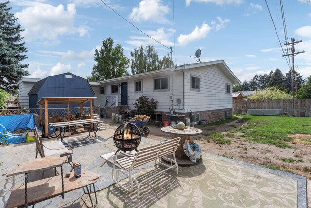 1506 Wilson St, Richland, WA 99354 - rear view of property with a fire pit and a patio