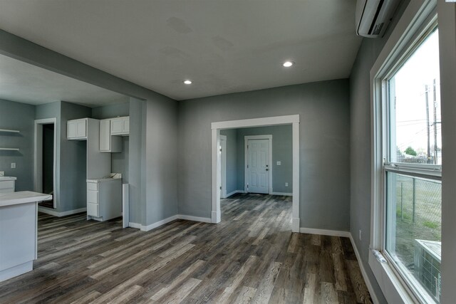 503 Grandridge Ave, Grandview, WA 98930 - unfurnished room with recessed lighting, dark wood-style flooring, and baseboards