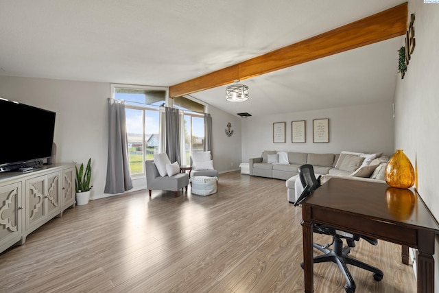 living room with vaulted ceiling with beams and light wood-type flooring