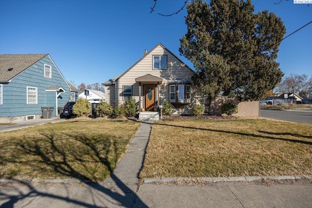 view of front of house with a front lawn