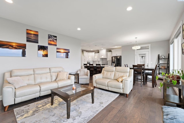 living room featuring dark hardwood / wood-style flooring