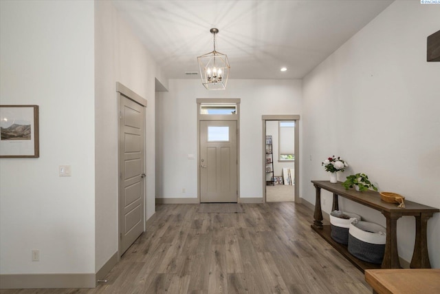 3905 Orchard St, West Richland, WA 99353 - entrance foyer with a chandelier, light wood-style flooring, baseboards, and recessed lighting