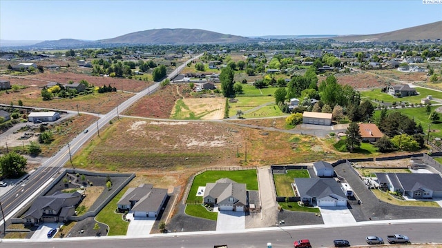 3905 Orchard St, West Richland, WA 99353 - aerial view of residential area featuring a mountain backdrop