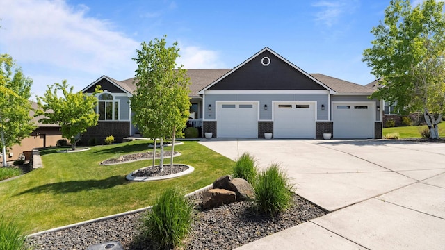 craftsman-style house with a front lawn, driveway, a garage, and brick siding