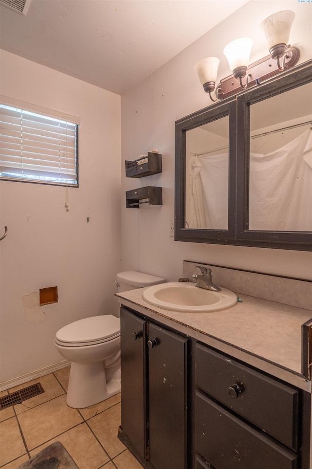 775 S 4th Ave, Othello, WA 99344 - full bath with tile patterned flooring, vanity, and toilet