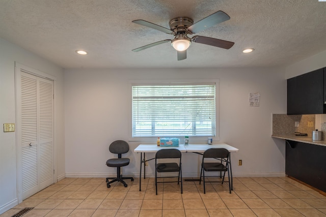 775 S 4th Ave, Othello, WA 99344 - dining space featuring recessed lighting, a textured ceiling, light tile patterned floors, a ceiling fan, and baseboards