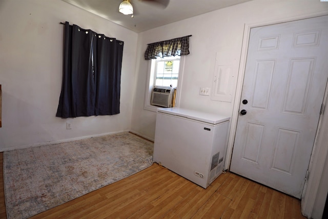 313 E 5th Ave, Kennewick, WA 99336 - washroom featuring light wood-style flooring, ceiling fan, and cooling unit