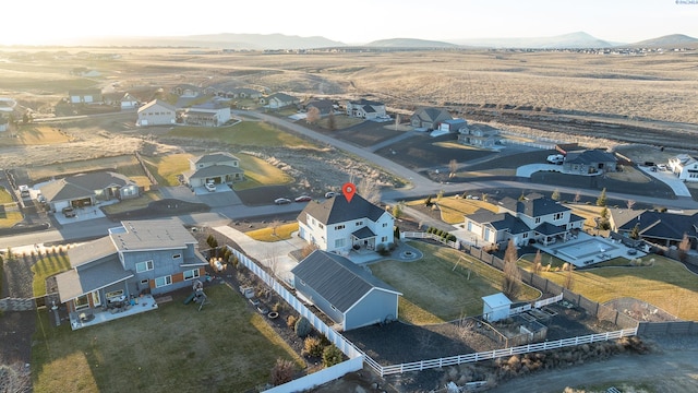 birds eye view of property featuring a residential view and a mountain view